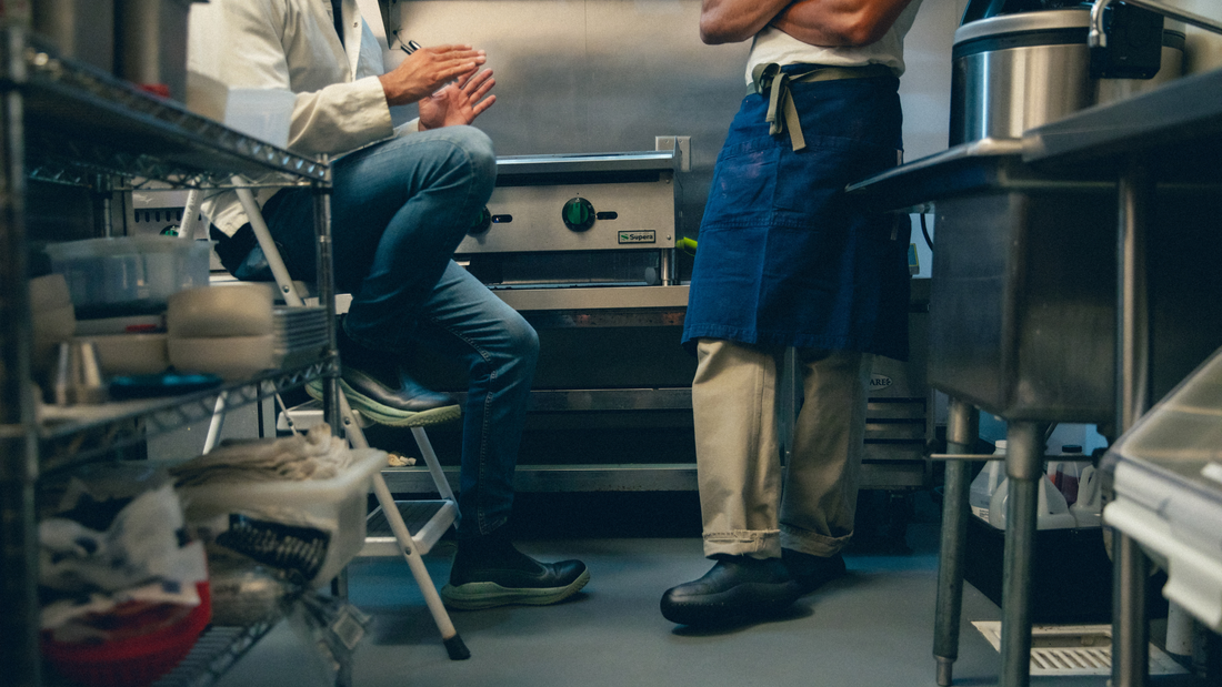 Workers wearing non-slip shoes in the kitchen