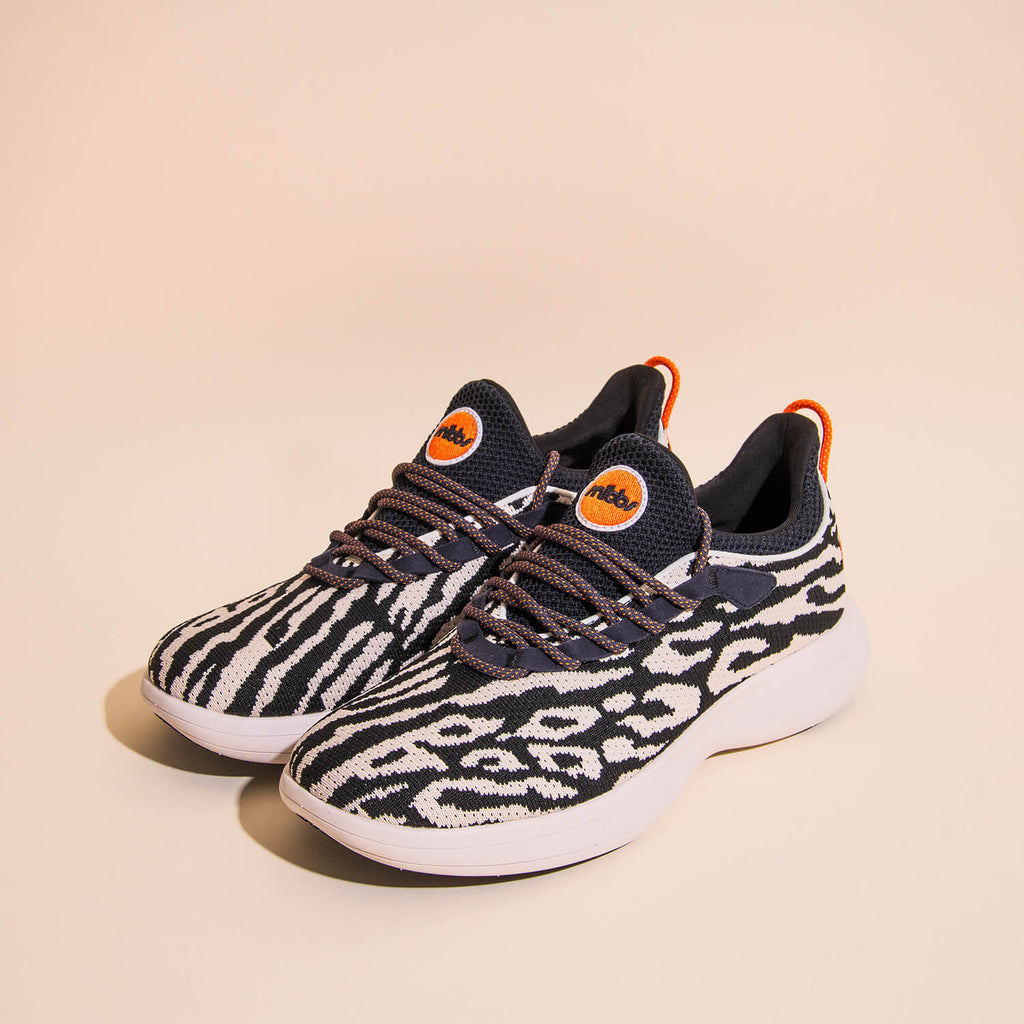 Orbit Snow Leopard: Animal Print Lightweight Knit Sneakers - Snibbs